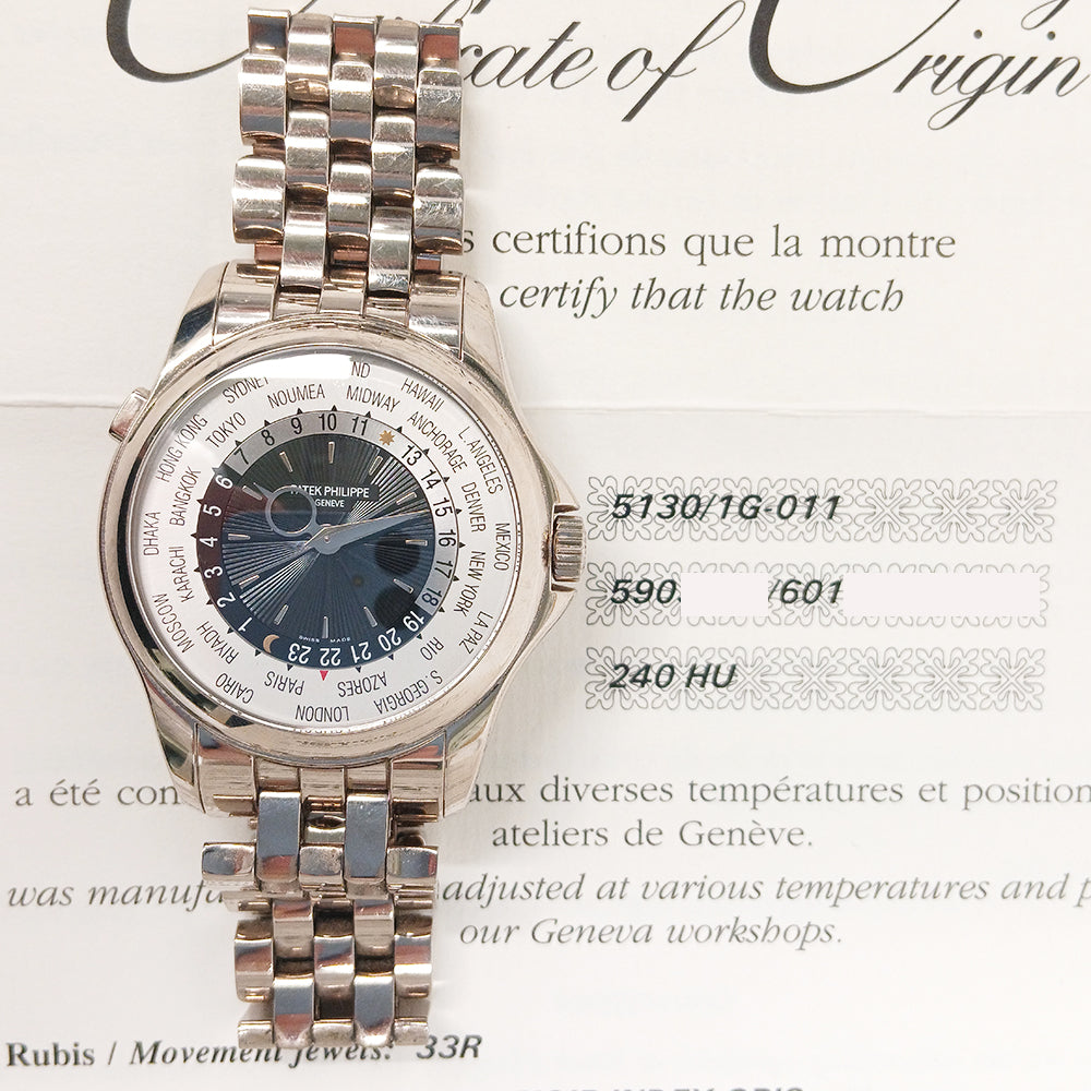 Patek Philippe World Time 39.5mm 5130/1G-011 – Sunburst Black with Gray Indices Dial