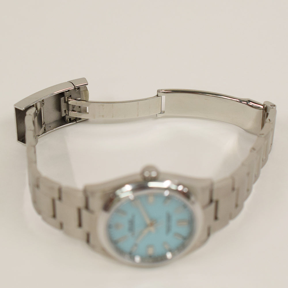 Rolex Oyster Perpetual 36mm Steel 126000 – Turquoise Dial